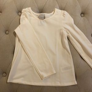 White puff shoulder shirt.